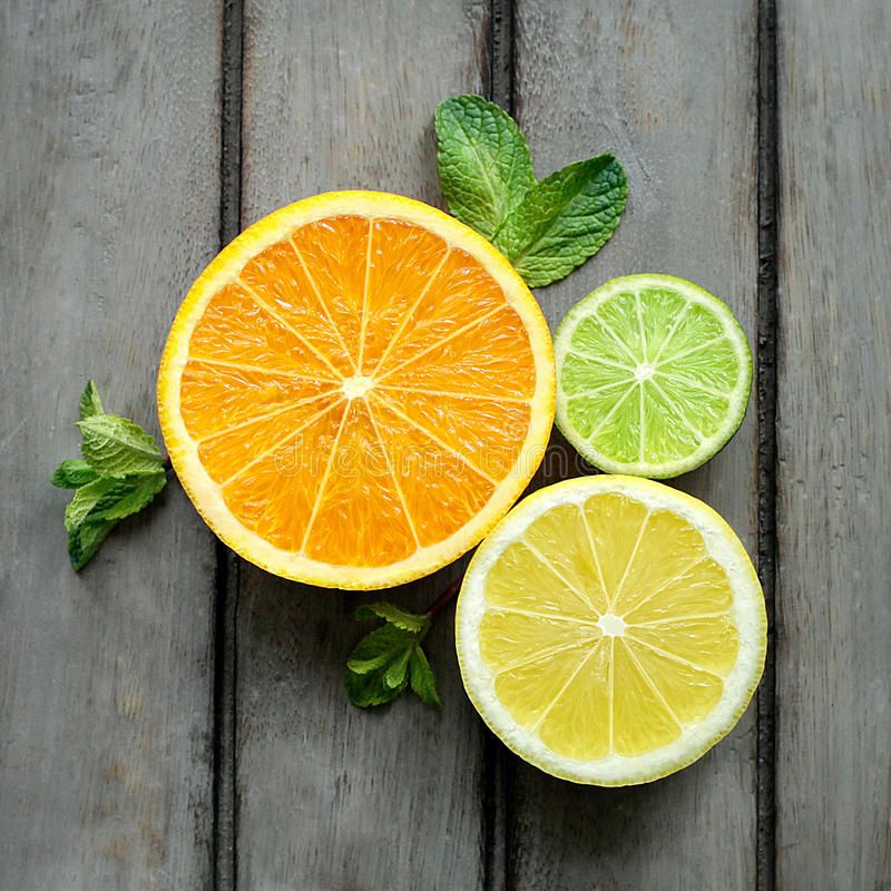 Fresh orange, lime and lemon halves